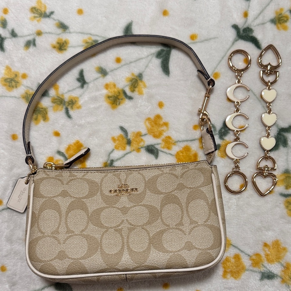 Nolita 19 in Signature Canvas with Bag Extender Chains